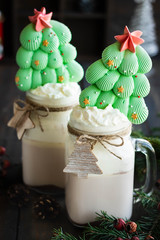 Christmas cocoa with meringue decor in large glass jars