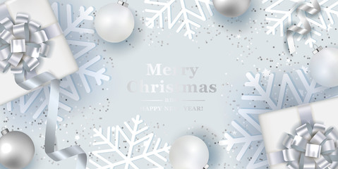 Christmas silver background with realistic  balls and gift boxes. Vector top view illustration. 