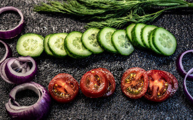 fresh cucumbers and tomatoes