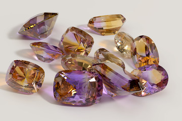 Colorful yellow and purple ametrine gemstones on white background