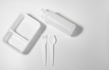 Stop using plastic. Plastic waste collection Plate, bowl, Spoon and fork, lunch box, bottle Made of Plastic. Concept of Recycling plastic and ecology problem (Environment concept).