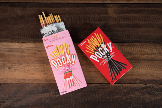 Petaling jaya, Selangor, Malaysia - 20 Oktober 2019 : Pocky brand of chocolate sticks on wooden background. Pocky is a famous confectionery among asian people