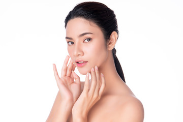 Beautiful young Asian woman touching soft cheek and smile with clean and fresh skin. Happiness and cheerful with, isolated on white background, Beauty and Cosmetics Concept,