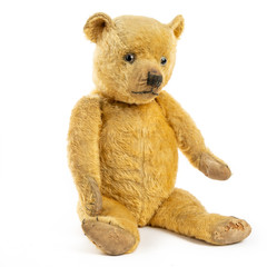 Vintage teddy bear on plain white background