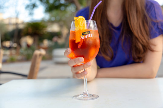 Aperol Spritz cocktail glass closeup