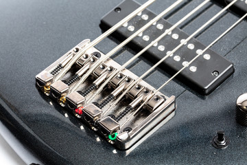 Modern 5 string bass guitar bridge