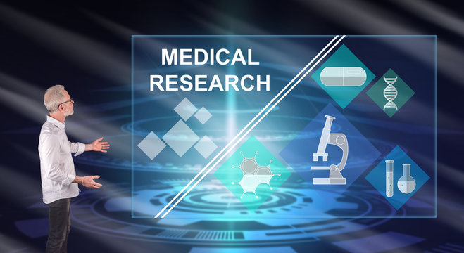 A medical research concept explained by a businessman on a wall screen