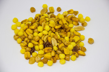 beer mix laid out on a white background. Raisins, Peanuts, Fried Corn, Chickpeas