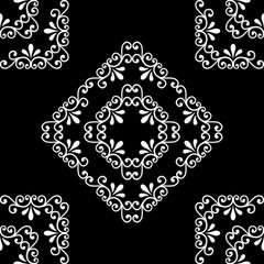 Seamless pattern texture of white square snowflakes isolated on a white background