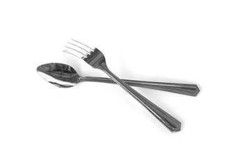 Spoon and fork on a white background