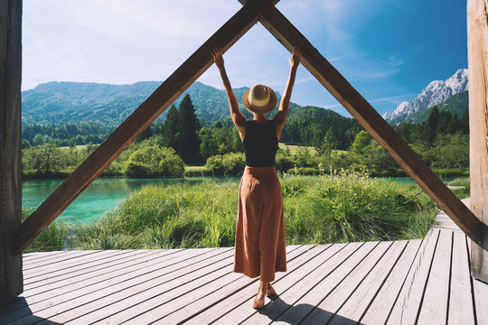 Woman enjoying freedom on nature outdoors. Travel Slovenia Europe.