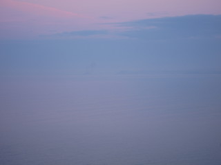 Obraz na płótnie Canvas Mist on the sea at sunset