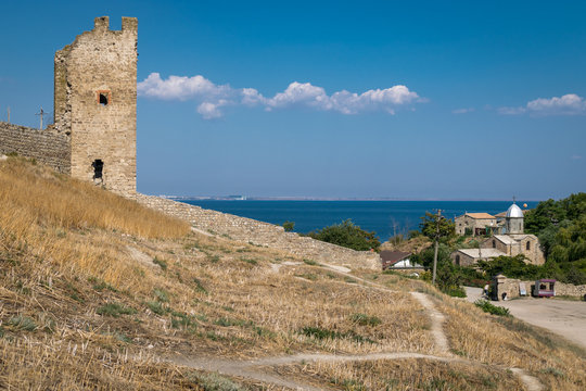 Tower of Crisco (Genoese fortress) and the church of the Iveron icon of the Mother of God in Crimea, Feodosia