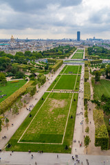 Obraz premium Great aerial portrait view of the Champ de Mars park in Paris. In the distance are the École Militaire building, the golden dome of the Les Invalides complex and the skyscraper Tour Montparnasse.