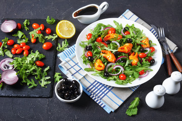 arugula crab clamps salad with black olives