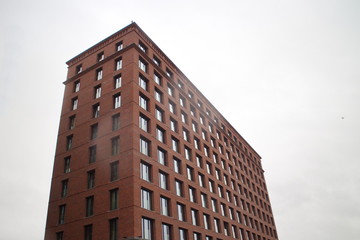 skyscraper bottom view in autumn day