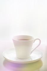Fototapeta na wymiar Coffee cup on wood table