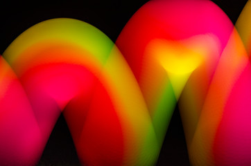 Glossy colorful Background. Light Painting with balls. Abstract