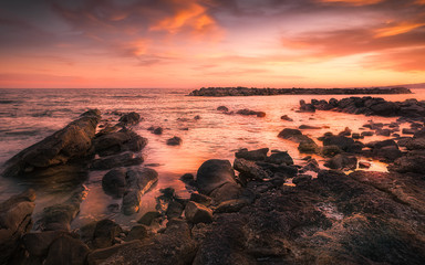 Fototapeta na wymiar sea rocks sunset landscape