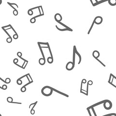 Music doodle icons seamless pattern. Hand drawn musical notes texture background.
