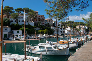 Fototapeta na wymiar Cala Figuera Majorca, view of this natural port and traditional village which retains an atmosphere of a working fishing port. View of sailboats moored in this beautiful location.