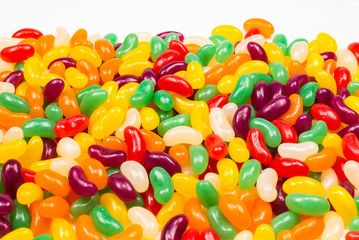 Colorful jelly beans isolated on white.