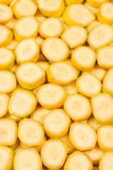 Fresh banana slices background. Top view.
