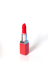 bright red lipstick on white background