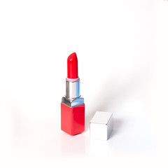 bright red lipstick on white background