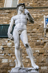 FLORENCE, TUSCANY/ITALY - OCTOBER 19 : Statue of David by Michelangelo on the Piazza della Signoria in front of the Palazzo Vecchio Florence on October 19, 2019