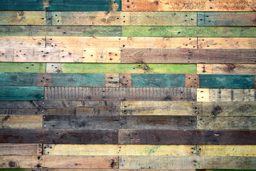 Grunge wood background in natural shades with green and blue