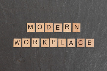 Obraz premium Modern Workplace Written With Game Tiles