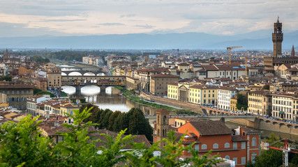 Fototapeta premium FLORENCE, TUSCANY/ITALY - OCTOBER 18 : View of buildings along and across the River Arno in Florence on October 18, 2019.