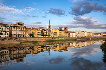 FLORENCE, TUSCANY/ITALY - OCTOBER 18 : View of buildings along and across the River Arno in Florence  on October 18, 2019. Unidentified people.