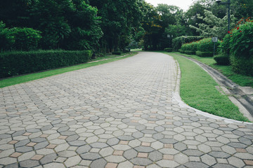 Space and cement brick floor in public park