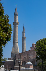 Fototapeta na wymiar Istanbul, Turkey: two minarets of Hagia Sophia, famous former Greek Orthodox Christian patriarchal cathedral, later Ottoman imperial mosque, now a museum, the epitome of Byzantine architecture