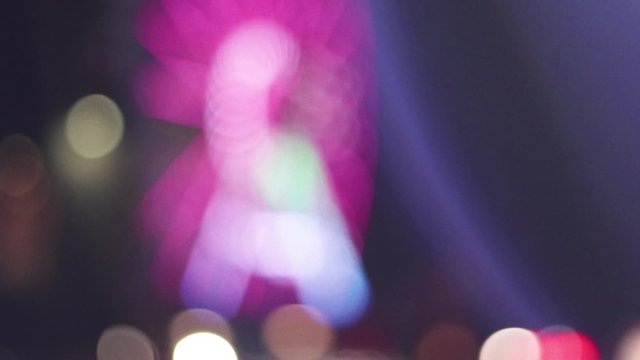 luci bokeh di ruota panoramica al luna park