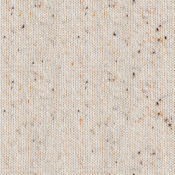 Seamless texture of beige melange knitted fabric.Cotton jersey background