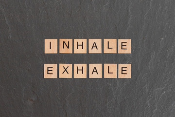 Inhale Exhale Written With Game Tiles