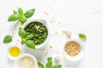 Pesto. Italian basil pesto sauce with culinary ingredients for cooking - obrazy, fototapety, plakaty