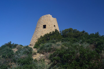 Fototapeta na wymiar Vista della torre di Capo Boi