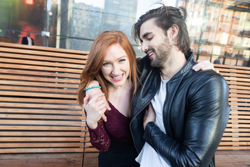 Attractive, healthy young couple outside together on a date
