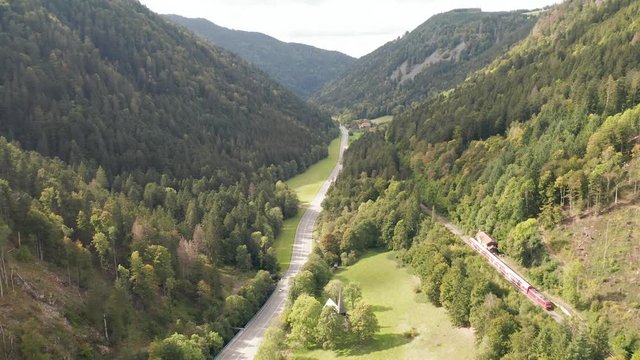 An aerial panorama of Breitnau (Germany) with autumn trees