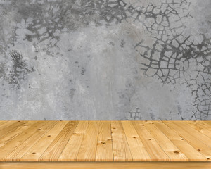 Empty brown old plank wooden board as mock up display shelf with abstract beautiful pattern and textured on flat cement wall in coffee shop and soft lighting background.