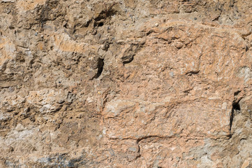 Ancient stone building mix of the exposed facade of the building during restoration. Grunge Abstract Background