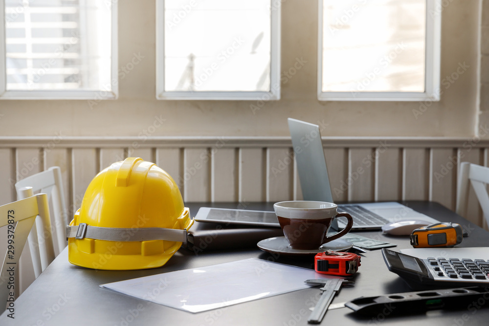 Wall mural close up of helmet and etc. on desk, architectural concept.