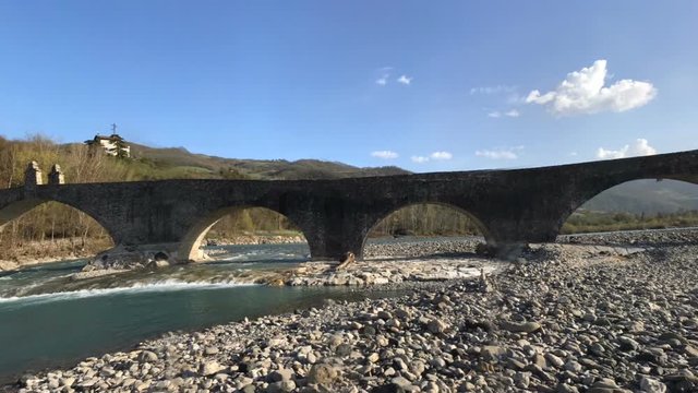 Bobbio, Italy, panoramic of the humpback bridge and the devil's kick