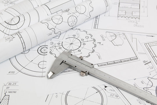 Calipers and engineering drawings of industrial parts and mechanisms