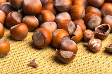 close up of hazelnuts on table .