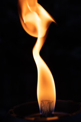 Tall flickering orange flame macro